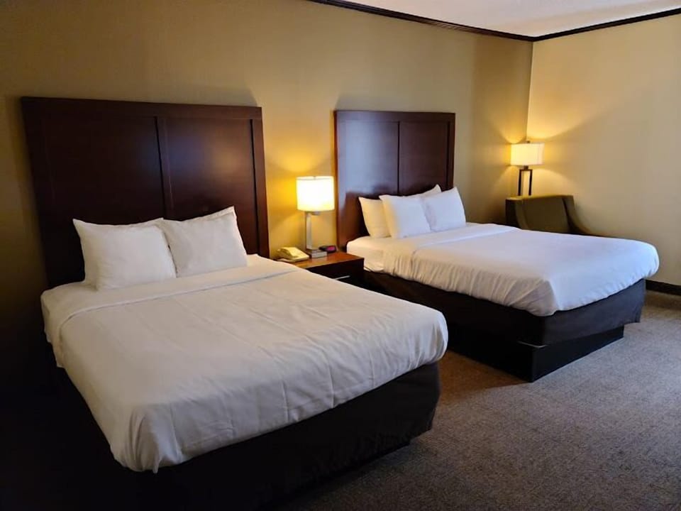 Standard Room, 2 Queen Beds, Non Smoking | Desk, laptop workspace, blackout drapes, soundproofing