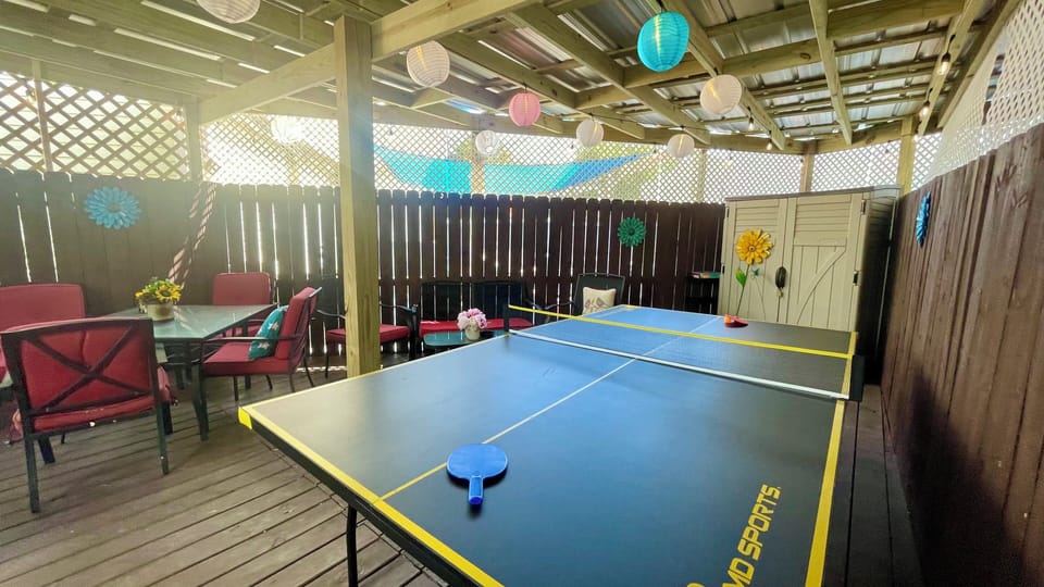 Covered back entertainment big patio with Ping Pong Table & Egg Chair Swings