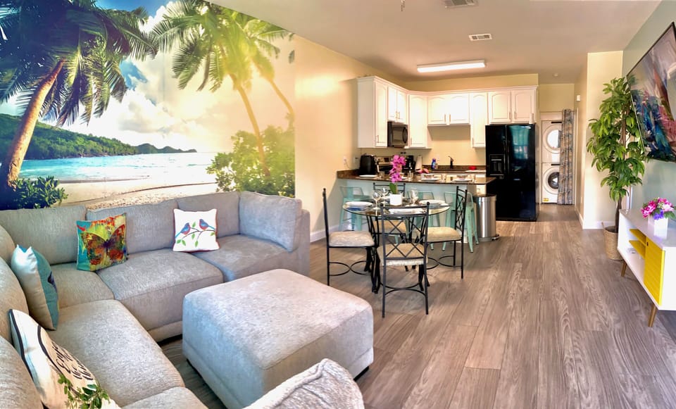 Open living area with 1 bedroom downstairs and 2 additional bedrooms upstairs