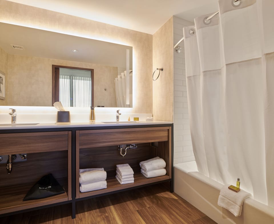 Suite, 1 Bedroom | Bathroom | Combined shower/tub, rainfall showerhead, hair dryer