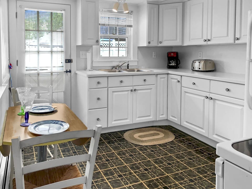 Kitchen and entrance to back yard and patio-25 Zylpha Rd Harwich Port- Cape Cod- New England Vacation Rentals
