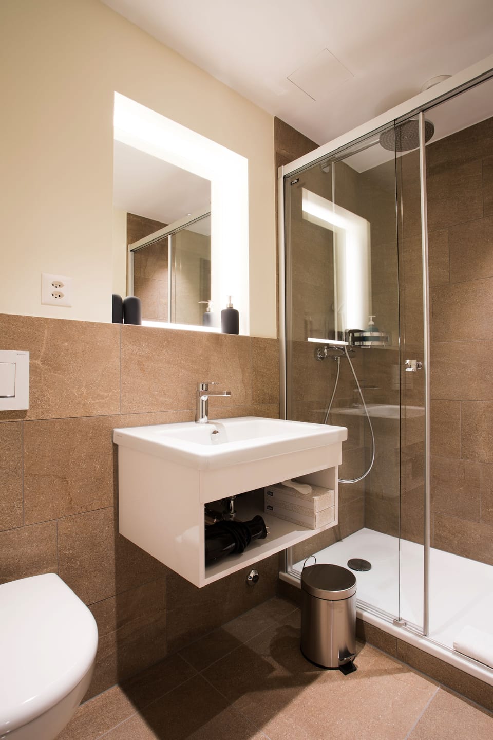 Shower, rainfall showerhead, eco-friendly toiletries, hair dryer