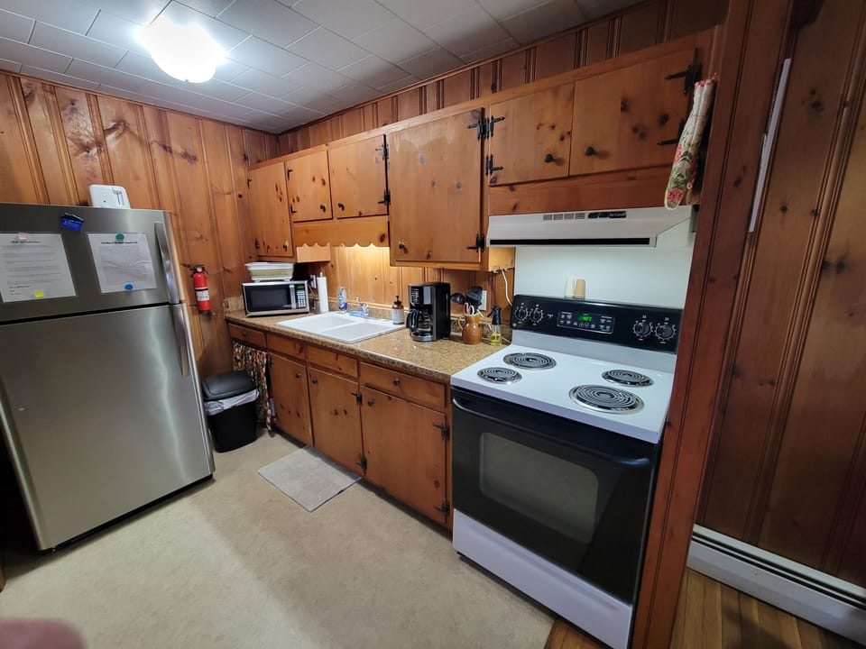 Kitchen, stocked with any dishes needed for cooking meals and most necessities. 