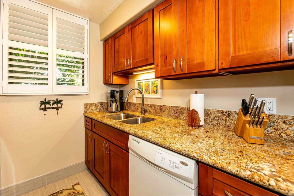 Fully equipped kitchen with modern appliances and ocean-view cooking!