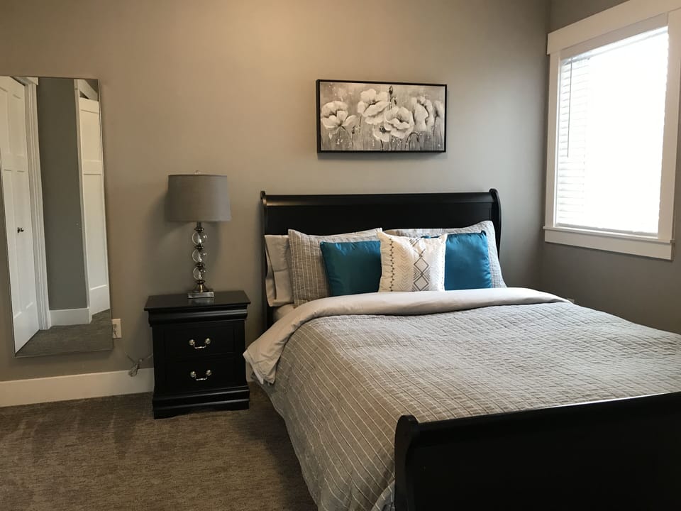 Queen bed with real down comforter
