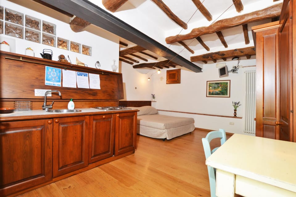 Family Villa, 6 Bedrooms, Microwave (Molino del Ponte) | Private kitchen | Stovetop, electric kettle, highchair, dining tables