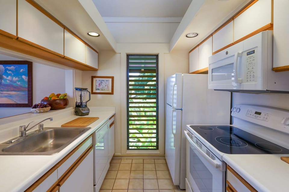 Easy to work in kitchen with plenty of air and cabinets. Create favorite meals