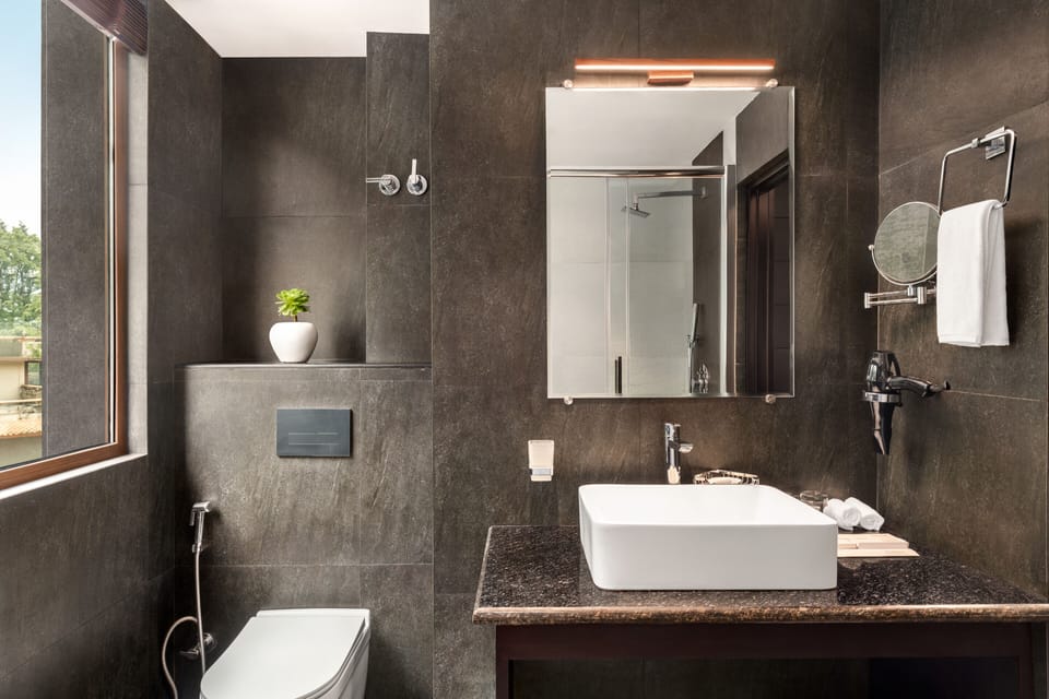 Duplex, Multiple Beds (City View) | Bathroom | Free toiletries, hair dryer, bathrobes, slippers
