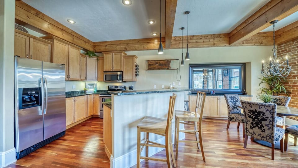 Fully-Appointed Kitchen with Bar Seating.