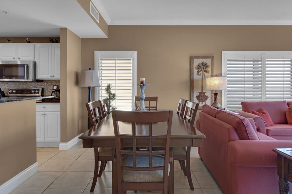 Living Room - This luxurious beachfront living room offers ultimate comfort, a spacious layout, a large flat-screen TV, and endless ocean views for the perfect retreat.