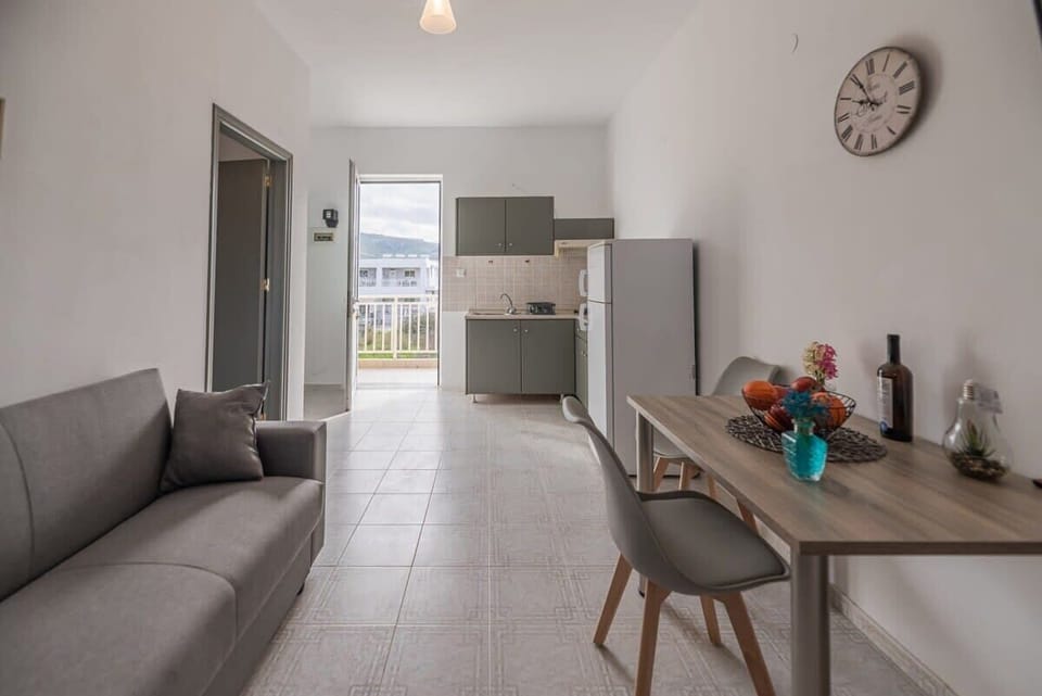 View of the Interior – Open and airy layout connecting bedroom and sitting area.