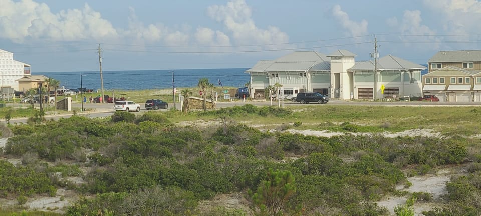 View of Ocean & Beach Club From Our Living/Dining Room, Patio, & Master Bedroom