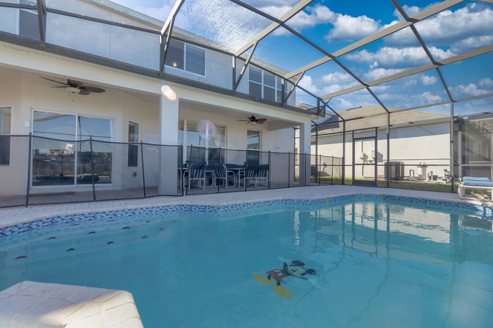 Covered patio area to enjoy the outdoors,  and removable pool safety fence.