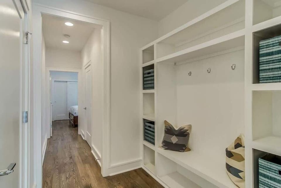 Condo entryway with hall tree for your inconvenience