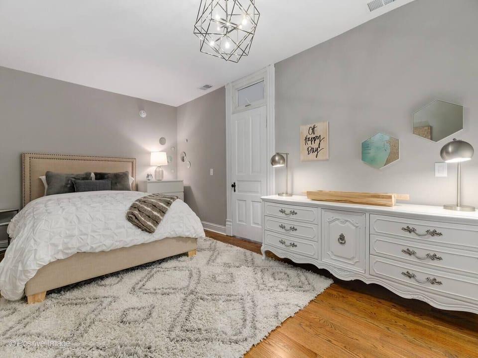 This is the final bedroom. It contains a queen bed and is located in the back of the apartment. With no exterior windows, your lightest sleepers will love this room.