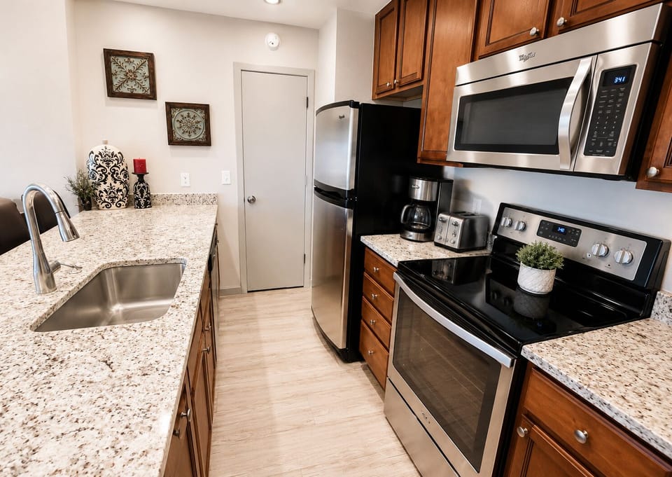 Well appointed and stocked kitchen w/ bar seating for 4