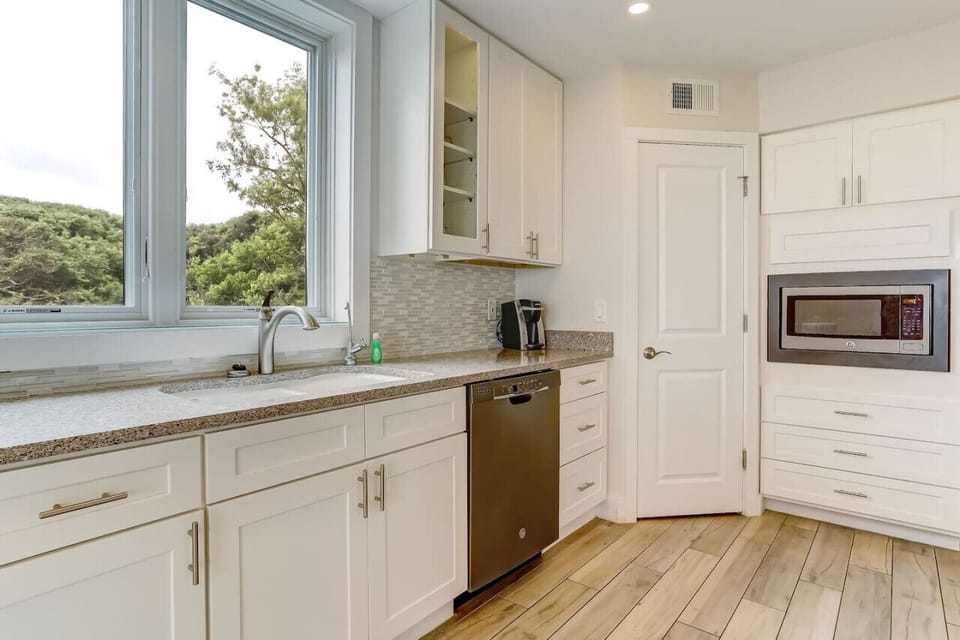 Kitchen with Keurig and Regular Drip Coffee pot and walk in pantry.