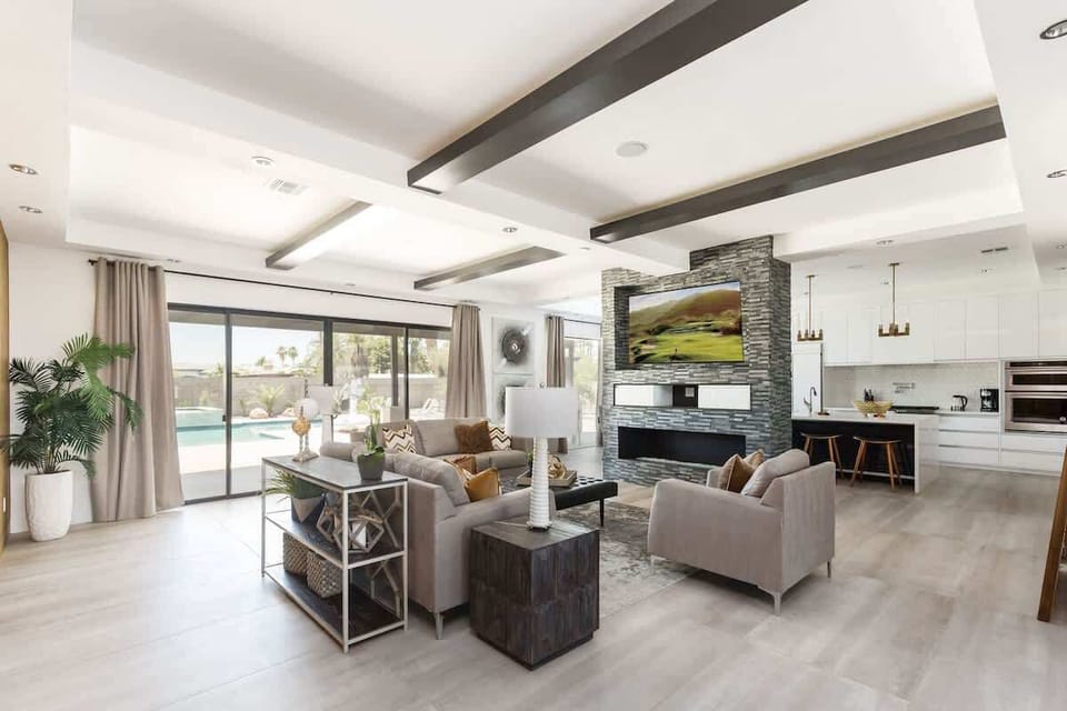 Bright Contemporary Living Room featuring a flat-screen SMART TV and designer furnishings.