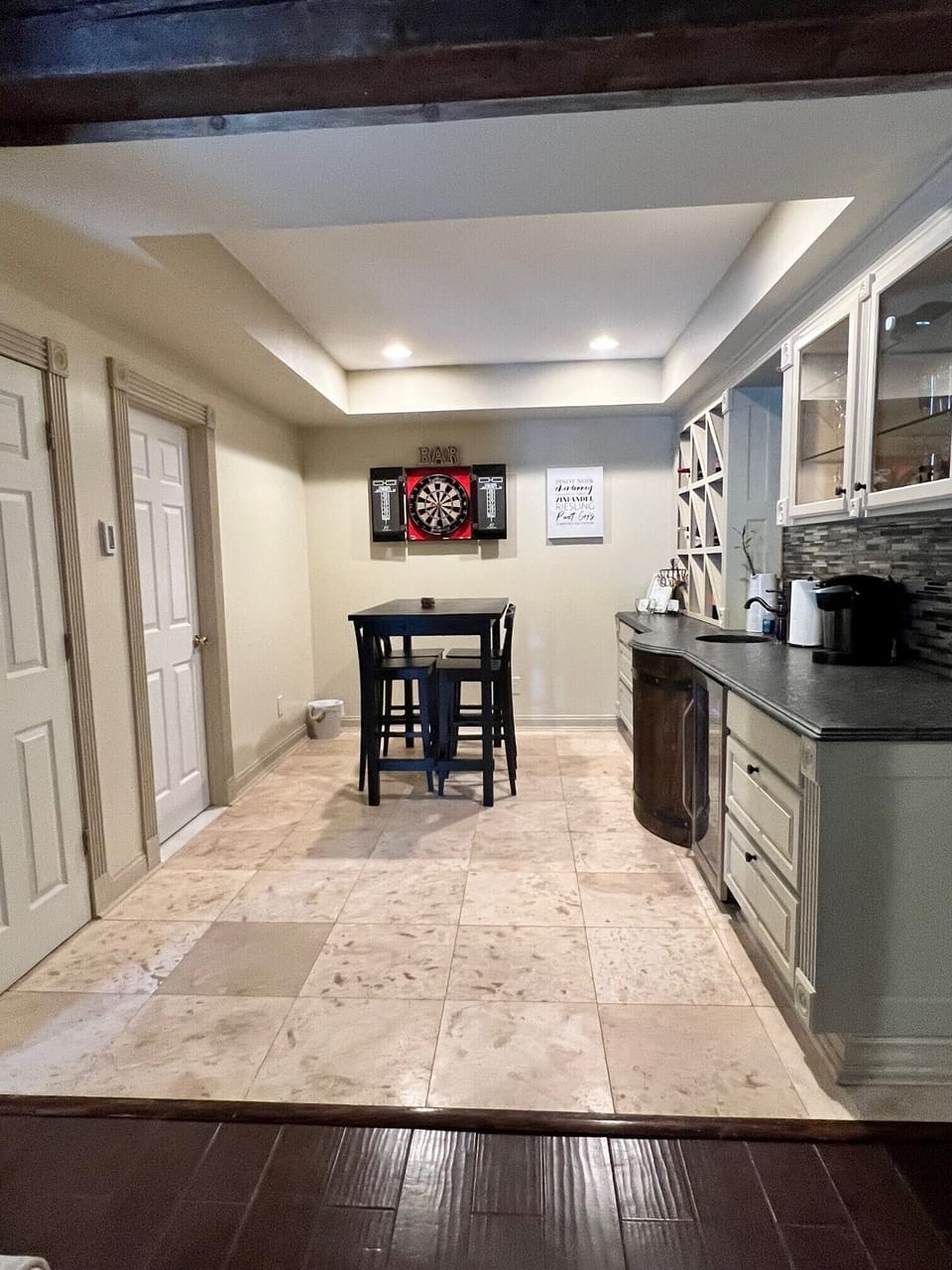 Enter into a newly renovated bedroom through the basement game area. 
