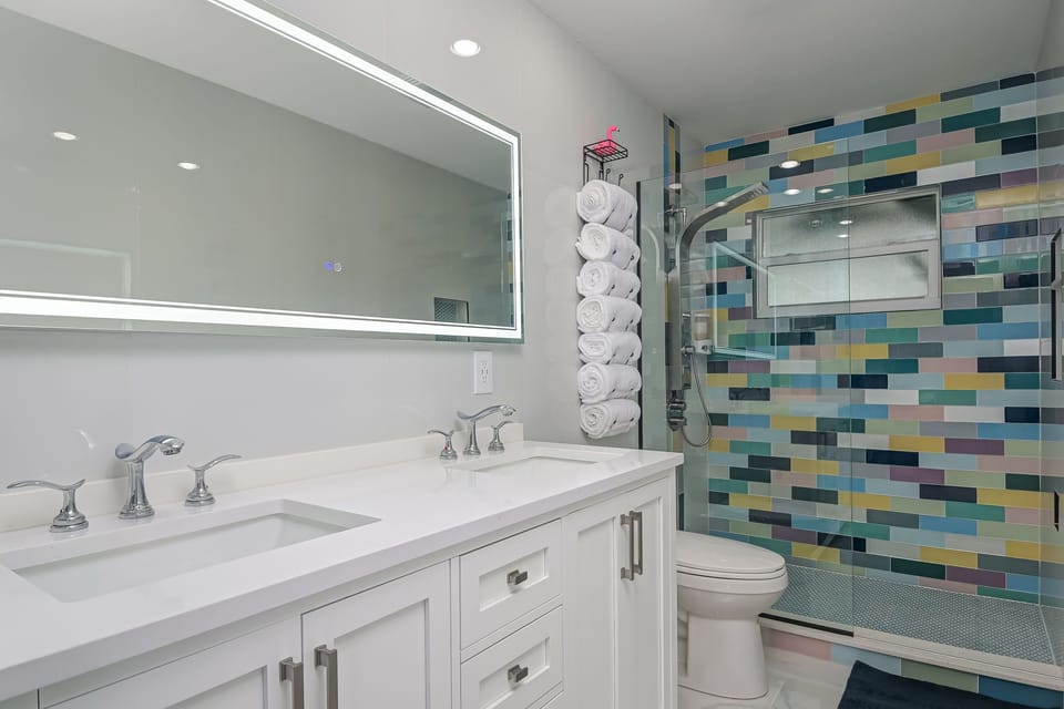 Rainfall shower head with body spray and hand wand.  Unbelievable. 