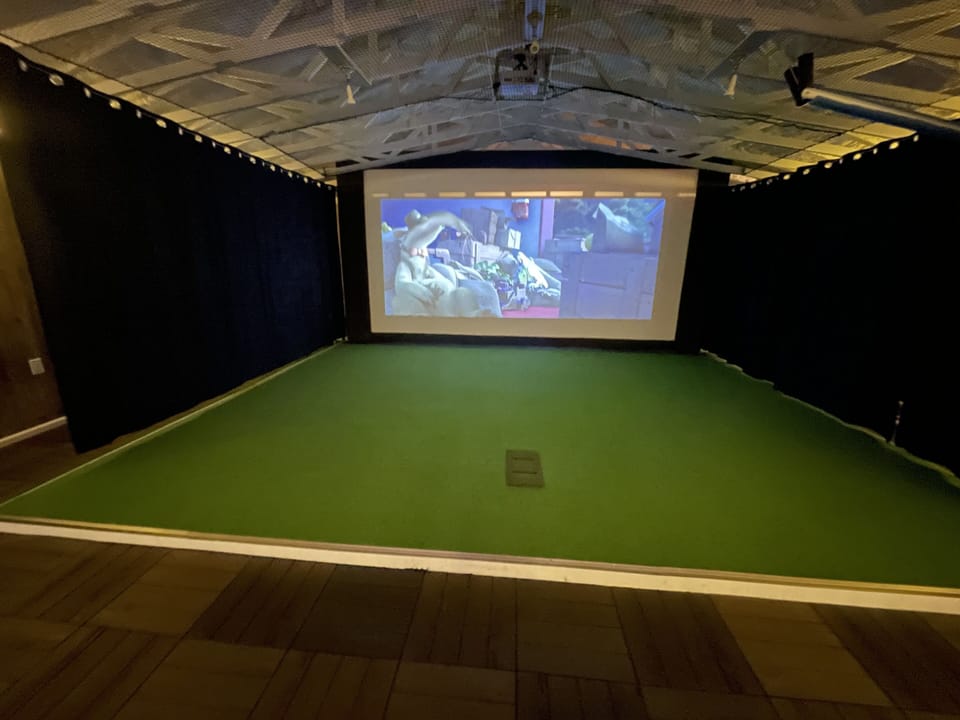 Switch golf sim setup to movie theater mode.    