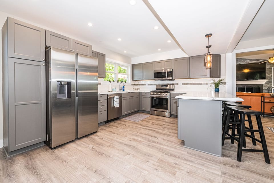 One of two complete kitchens stocked with most of very thing you need.  