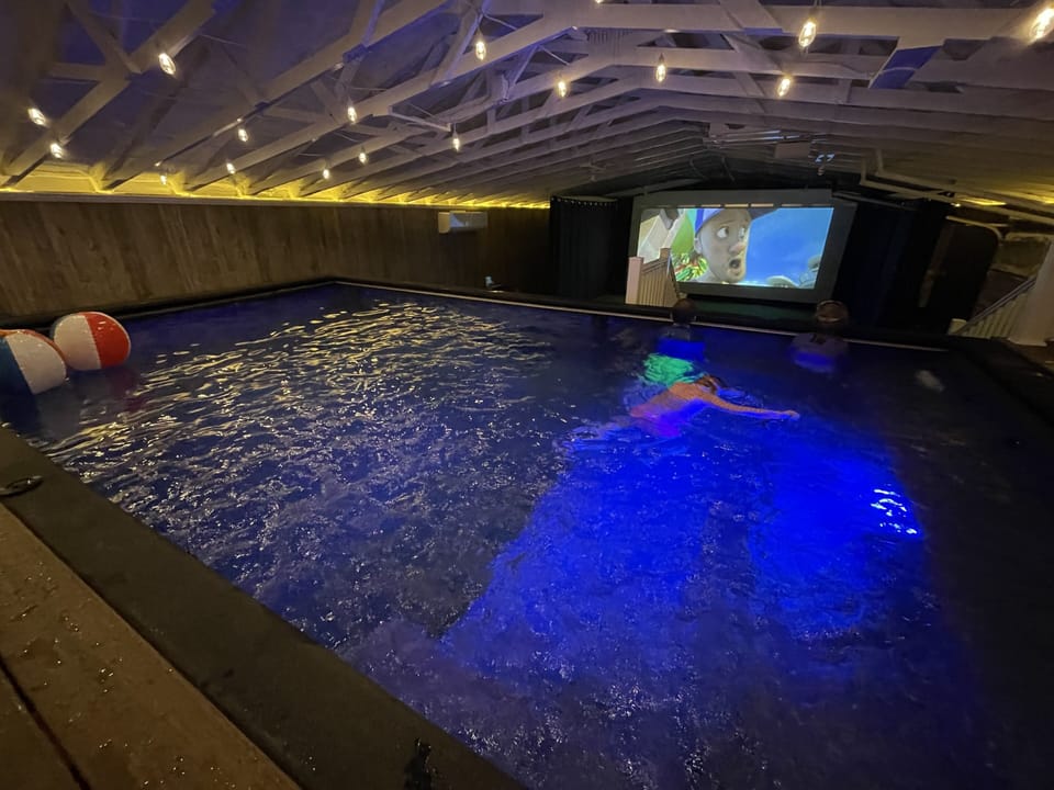 Swim and watch movies at the same time.  Heated to 89 degrees year around.  