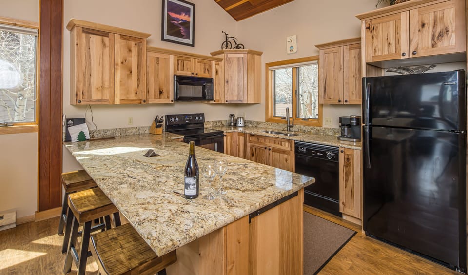 Kitchen with Bar Seating for 3