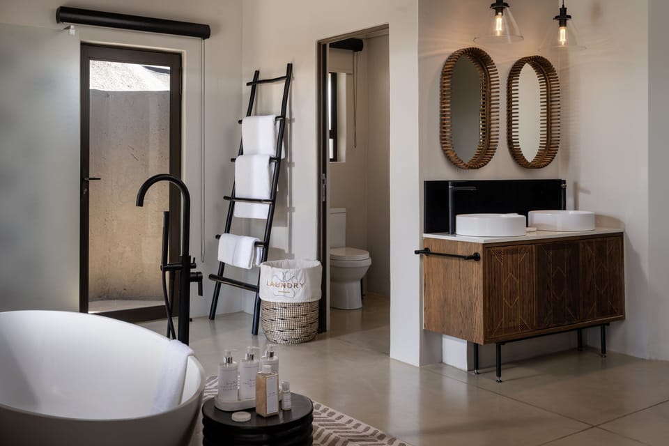 Separate tub and shower, free toiletries, hair dryer, bathrobes