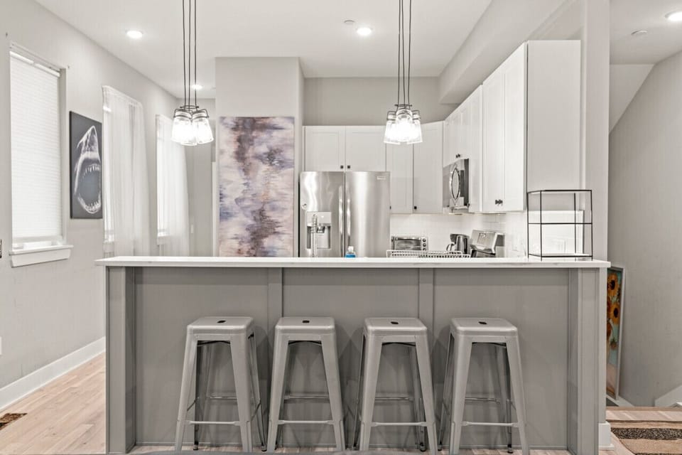 Clean & Contemporary Kitchen with Stainless Steel Appliances