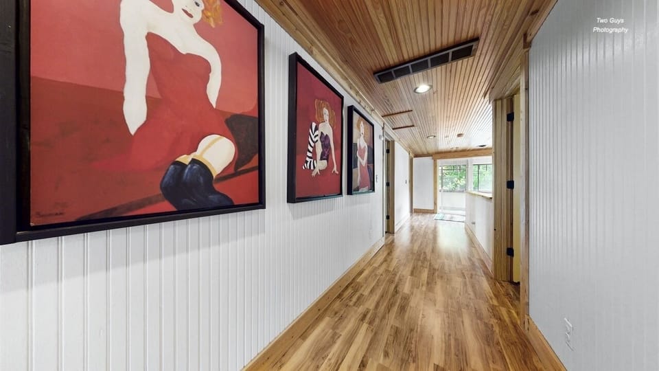 2nd floor hallway with 4 bedrooms and two full bathrooms