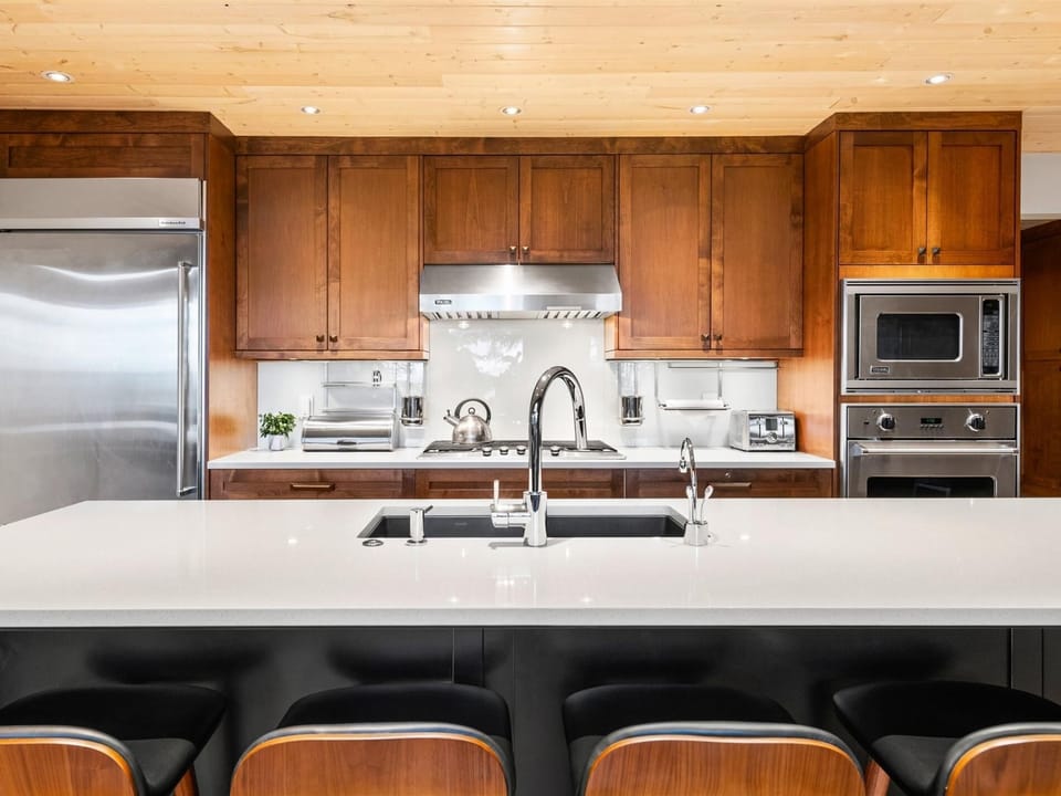 Stainless steel appliances, gas range, oven, steam oven, wine fridges, hot water on demand