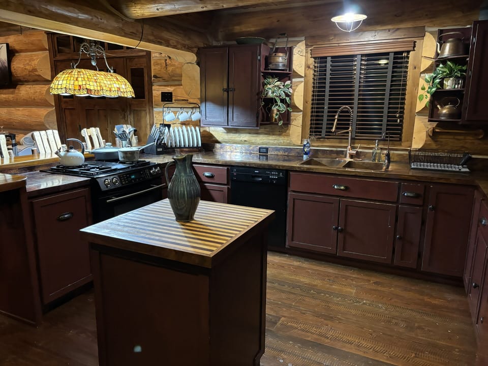 Prepare meals with ease in the well-equipped kitchen.