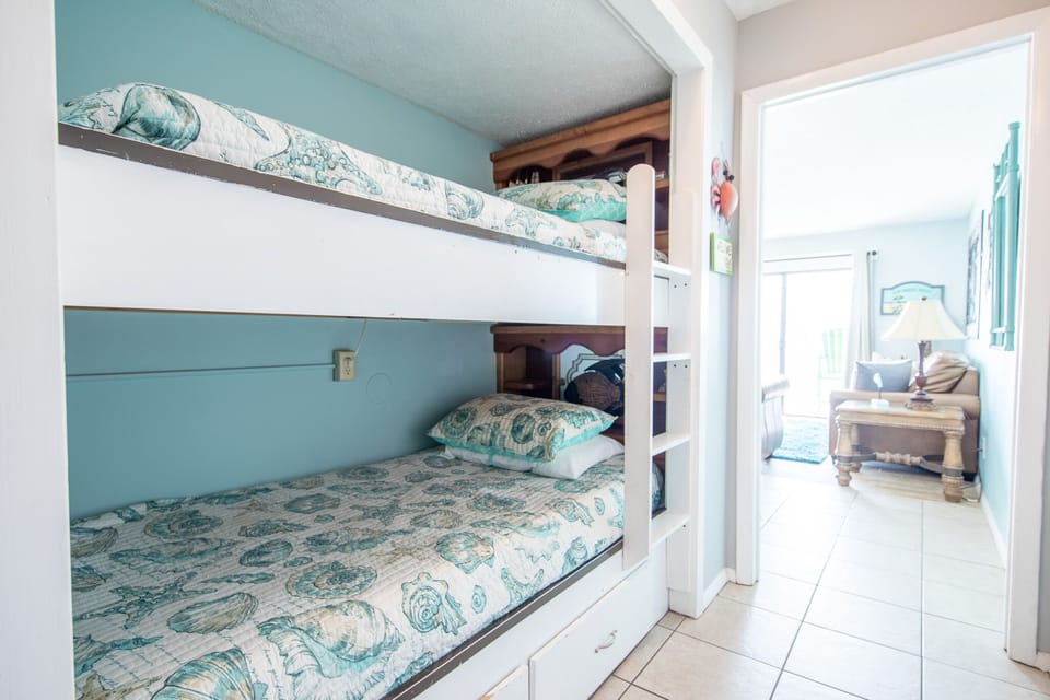 Twin size bunkbeds in the hallway nook.