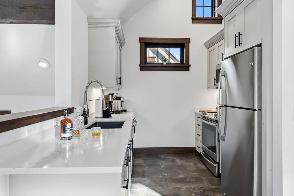 Kitchen with brand new stainless steel appliances