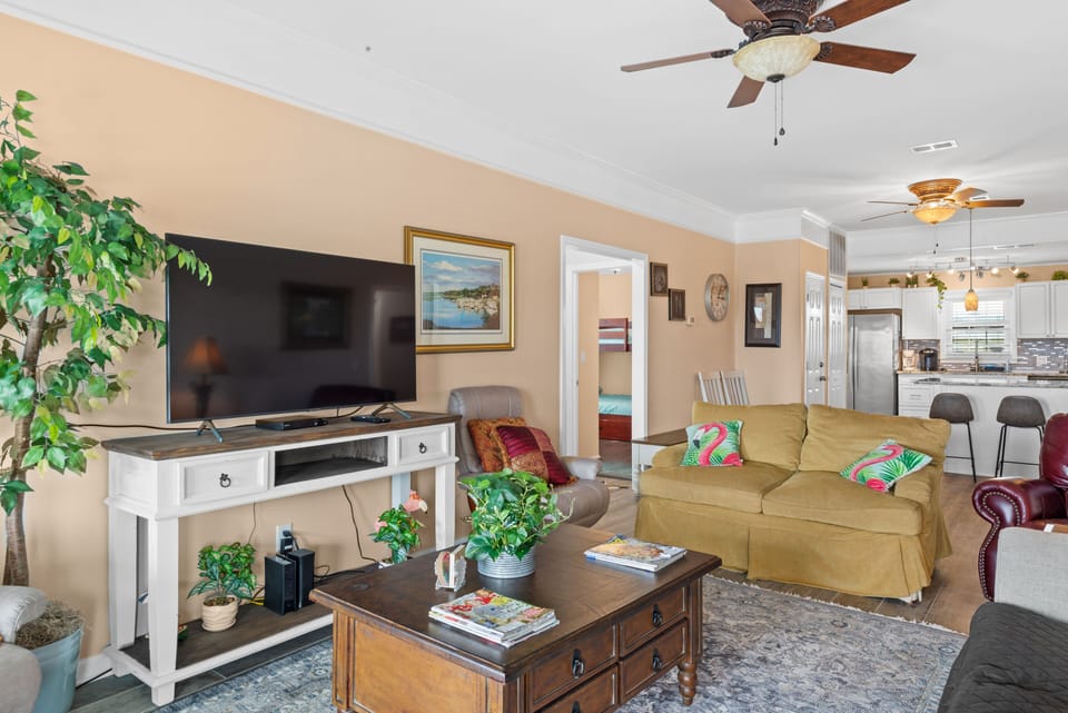 Gather the family for a movie night in this comfy living room.