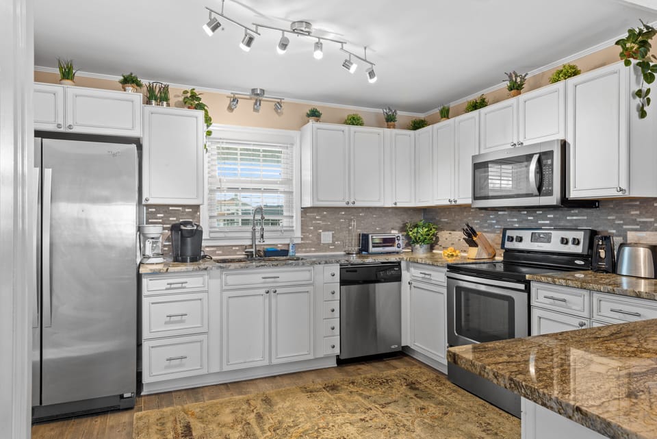 An updated kitchen makes preparing meals a breeze.