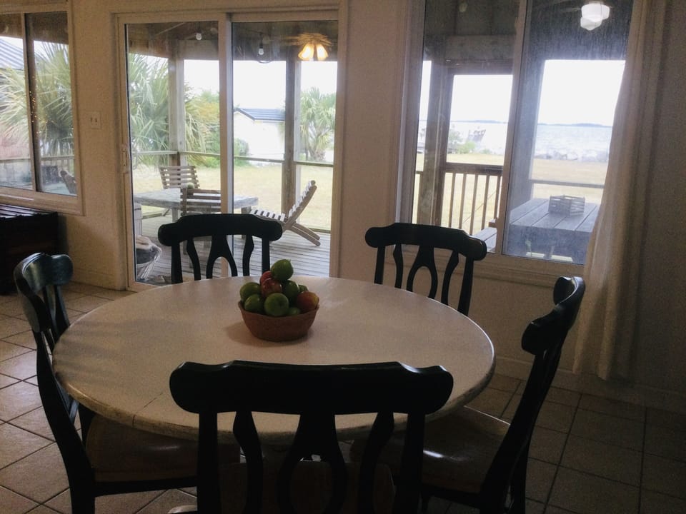 Main room looks out upon Cedar Island Bay.