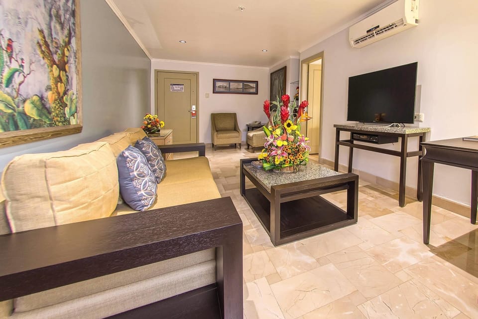 Suite, 2 Double Beds, Non Smoking | Minibar, in-room safe, desk, laptop workspace
