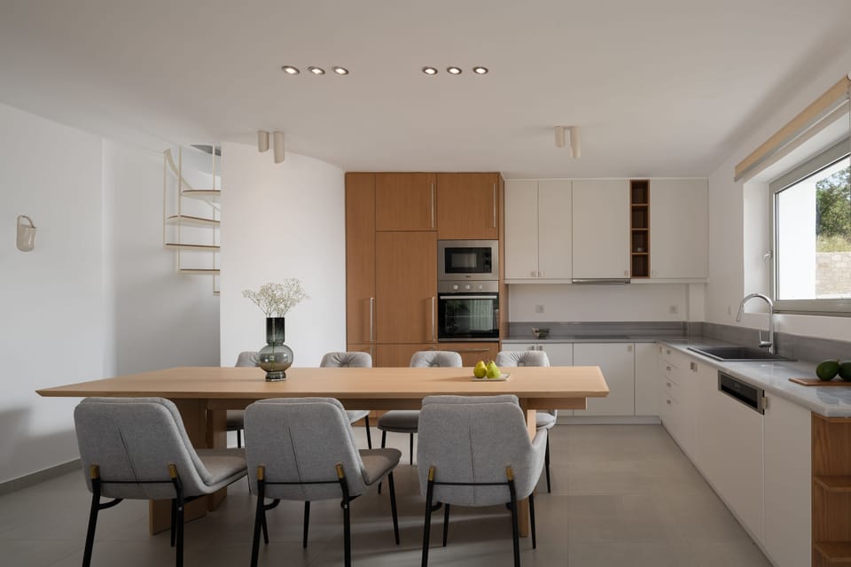 The open plan kitchen-dining area. 