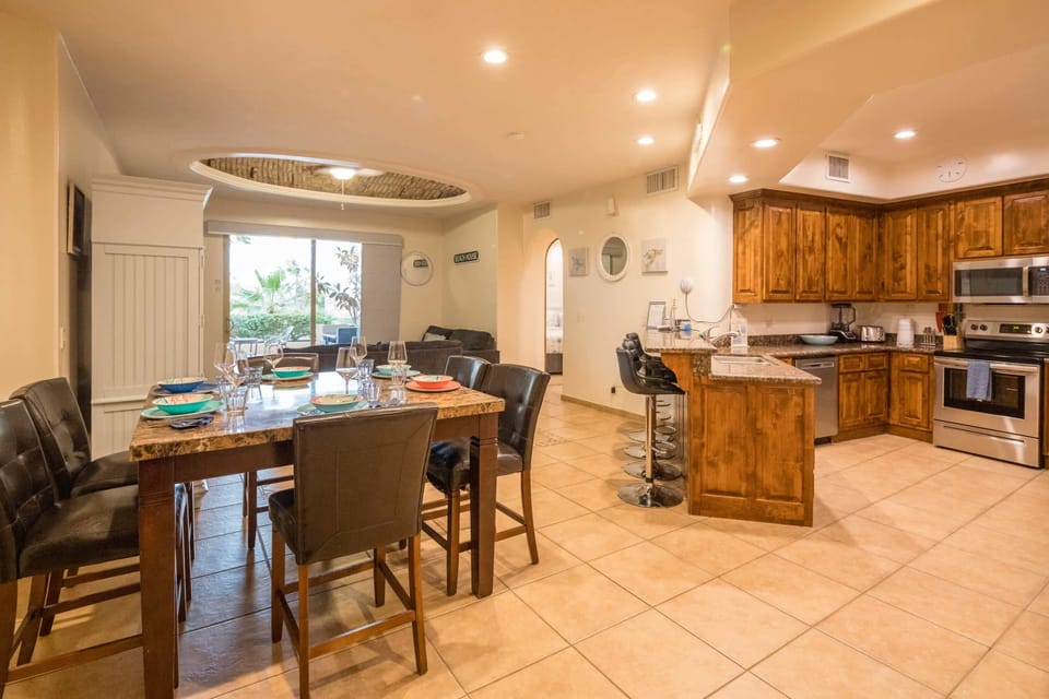 Enjoy your meals indoors with seating for six and garden views just steps from the table.