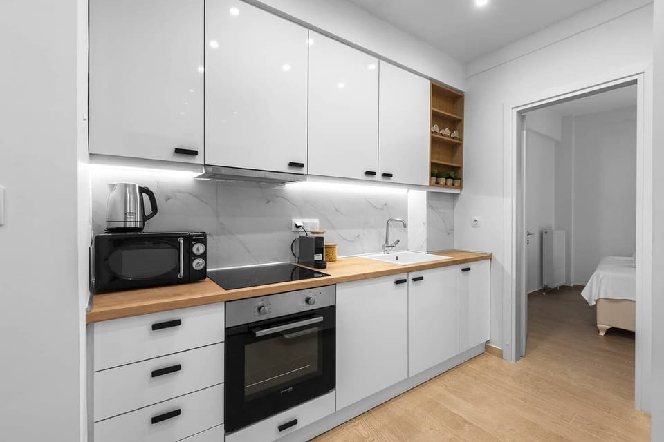 Apartment | Private kitchen | Full-size fridge, coffee/tea maker, electric kettle, toaster