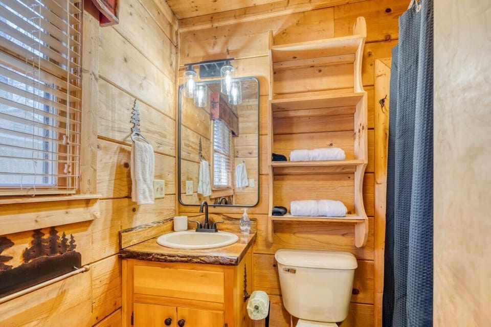 Rustic bathroom with warm wooden interiors