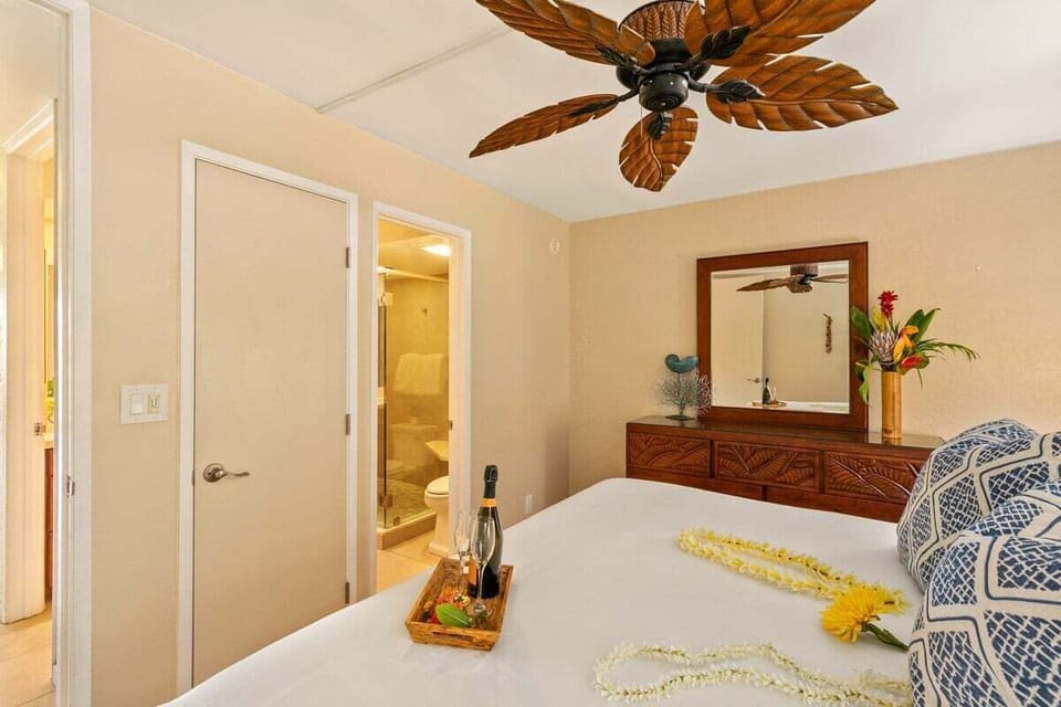 Relax in a tropical suite with cozy details.