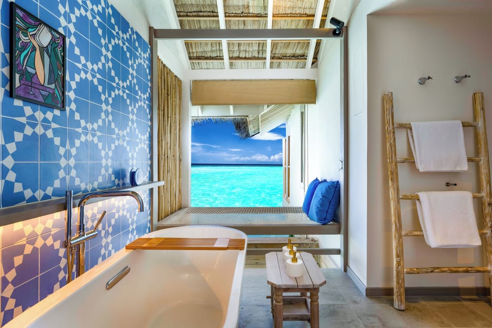 Separate tub and shower, rainfall showerhead, eco-friendly toiletries