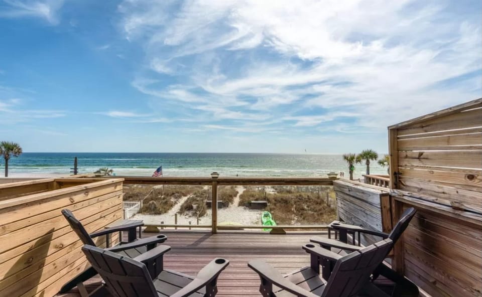 Relax on your private deck with stunning ocean views, where morning coffee and sunset drinks become magical moments.