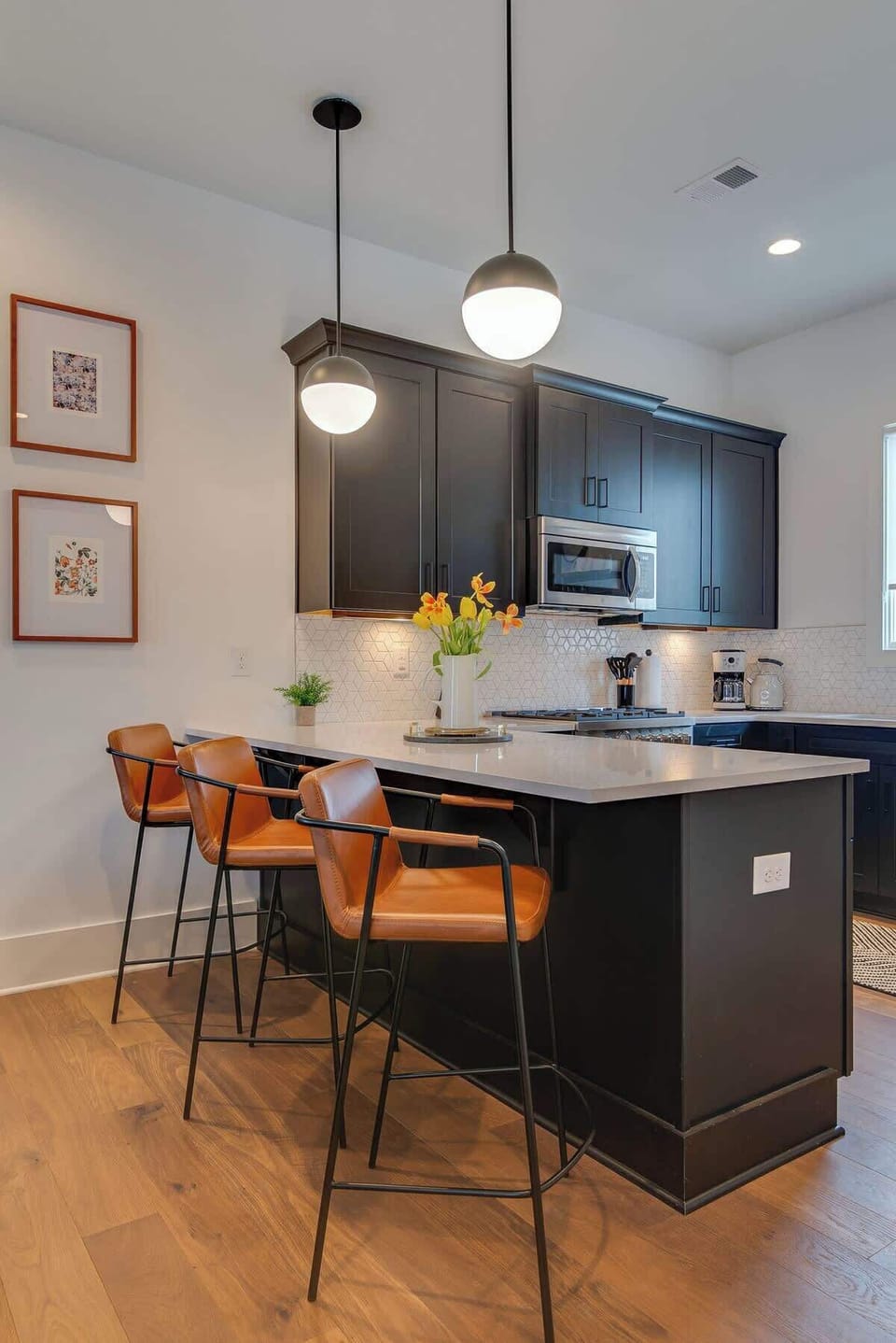 Bar stools add the perfect perch for easy dining, conversation, or a cozy start to the day.
