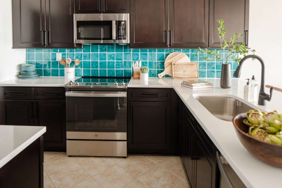 Fully equipped kitchen with coffee maker, toaster, blender pots pans dishes and more!
