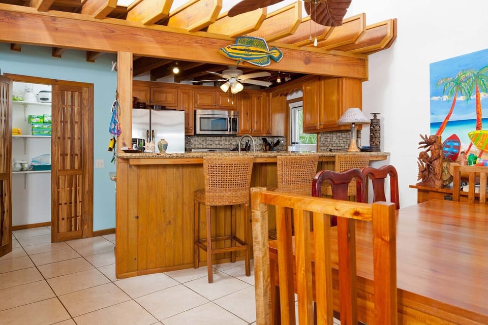 Open kitchen with dining room