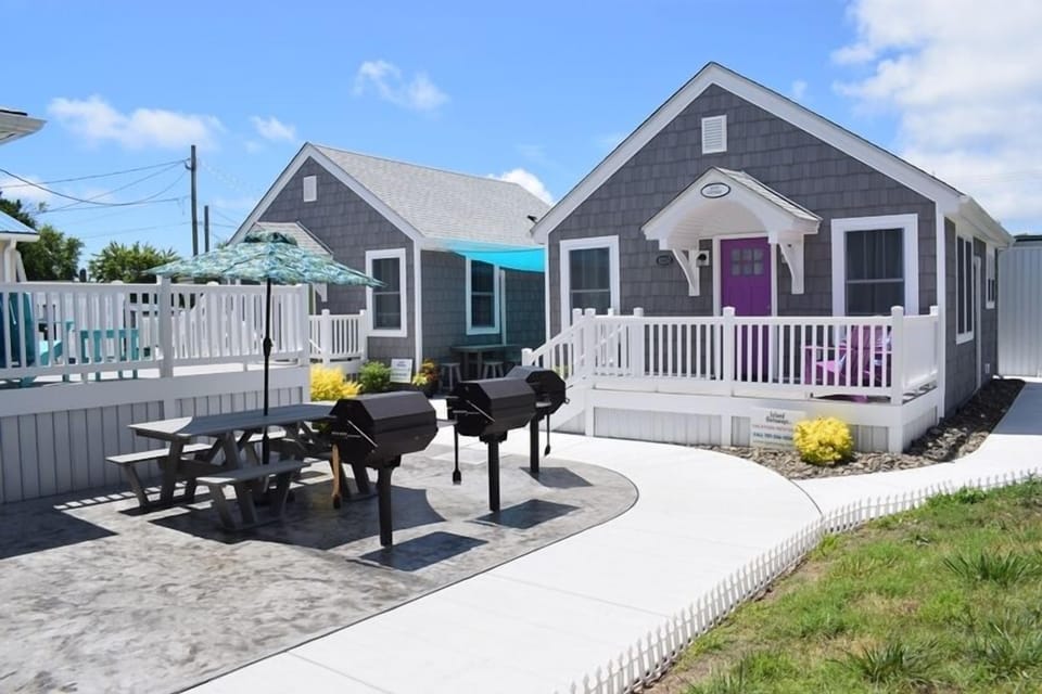 Enjoy a fantastic outdoor space with a sun-sail shaded lounge area and a picnic spot complete with grills - ideal for relaxing or entertaining.